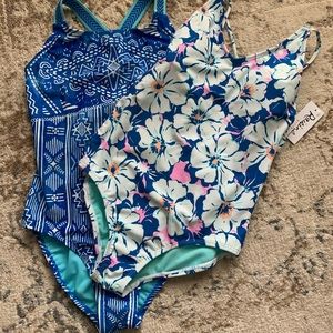 Brand new girls swimsuits with tags attached